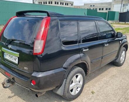 Черный Ниссан ИксТрейл, объемом двигателя 2.18 л и пробегом 210 тыс. км за 6400 $, фото 2 на Automoto.ua