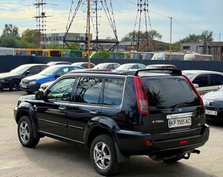 Черный Ниссан ИксТрейл, объемом двигателя 2.2 л и пробегом 360 тыс. км за 7300 $, фото 2 на Automoto.ua
