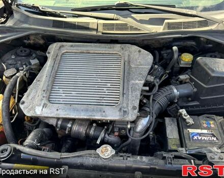 Черный Ниссан ИксТрейл, объемом двигателя 2.2 л и пробегом 239 тыс. км за 3800 $, фото 4 на Automoto.ua