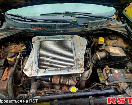 Черный Ниссан ИксТрейл, объемом двигателя 2.2 л и пробегом 248 тыс. км за 3800 $, фото 5 на Automoto.ua