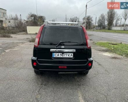 Черный Ниссан ИксТрейл, объемом двигателя 2.5 л и пробегом 285 тыс. км за 6500 $, фото 4 на Automoto.ua