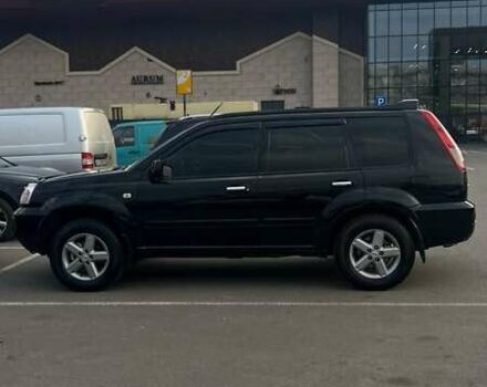 Черный Ниссан ИксТрейл, объемом двигателя 2.5 л и пробегом 261 тыс. км за 8300 $, фото 14 на Automoto.ua