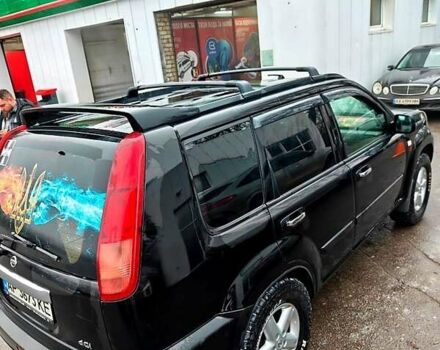 Черный Ниссан ИксТрейл, объемом двигателя 2.2 л и пробегом 100 тыс. км за 5500 $, фото 2 на Automoto.ua