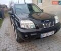 Черный Ниссан ИксТрейл, объемом двигателя 2.2 л и пробегом 350 тыс. км за 7400 $, фото 1 на Automoto.ua