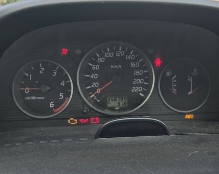 Черный Ниссан ИксТрейл, объемом двигателя 2 л и пробегом 358 тыс. км за 4300 $, фото 4 на Automoto.ua