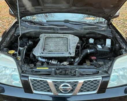 Черный Ниссан ИксТрейл, объемом двигателя 2.2 л и пробегом 306 тыс. км за 3300 $, фото 4 на Automoto.ua