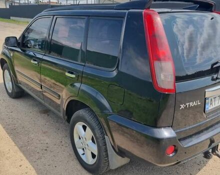 Черный Ниссан ИксТрейл, объемом двигателя 2.18 л и пробегом 210 тыс. км за 6400 $, фото 4 на Automoto.ua