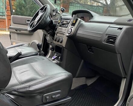 Черный Ниссан ИксТрейл, объемом двигателя 2.2 л и пробегом 226 тыс. км за 3650 $, фото 8 на Automoto.ua