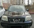 Черный Ниссан ИксТрейл, объемом двигателя 2.5 л и пробегом 261 тыс. км за 8300 $, фото 1 на Automoto.ua