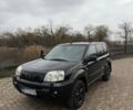 Черный Ниссан ИксТрейл, объемом двигателя 2.2 л и пробегом 249 тыс. км за 2600 $, фото 1 на Automoto.ua