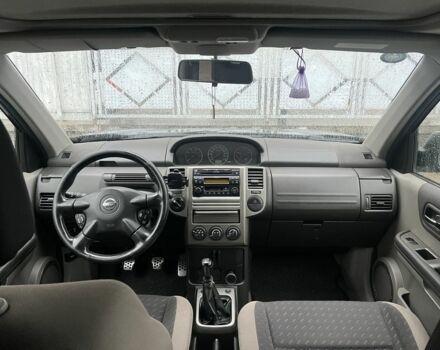 Черный Ниссан ИксТрейл, объемом двигателя 2.2 л и пробегом 206 тыс. км за 4200 $, фото 7 на Automoto.ua