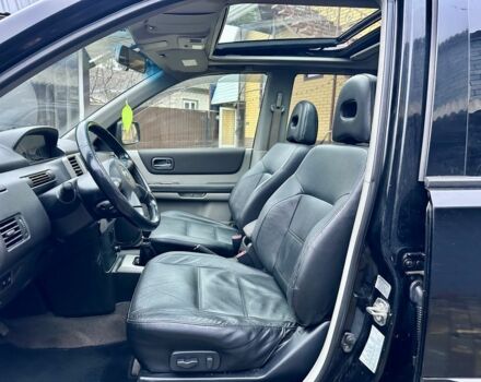 Черный Ниссан ИксТрейл, объемом двигателя 2.2 л и пробегом 168 тыс. км за 6699 $, фото 18 на Automoto.ua