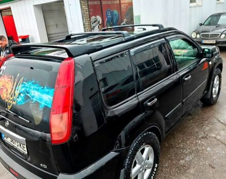 Черный Ниссан ИксТрейл, объемом двигателя 2.2 л и пробегом 100 тыс. км за 5500 $, фото 3 на Automoto.ua