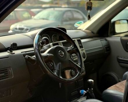 Черный Ниссан ИксТрейл, объемом двигателя 2.2 л и пробегом 360 тыс. км за 7300 $, фото 7 на Automoto.ua