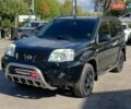 Черный Ниссан ИксТрейл, объемом двигателя 2.5 л и пробегом 295 тыс. км за 6890 $, фото 1 на Automoto.ua
