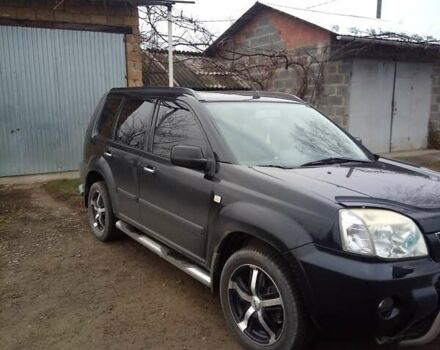 Черный Ниссан ИксТрейл, объемом двигателя 2.5 л и пробегом 202 тыс. км за 6700 $, фото 1 на Automoto.ua