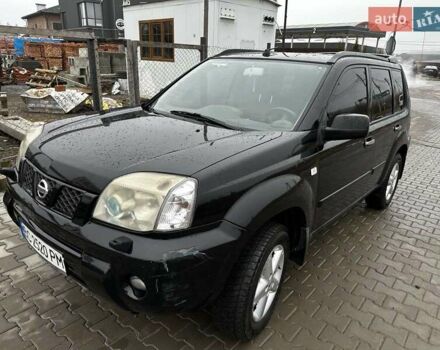 Черный Ниссан ИксТрейл, объемом двигателя 2.5 л и пробегом 282 тыс. км за 6250 $, фото 1 на Automoto.ua