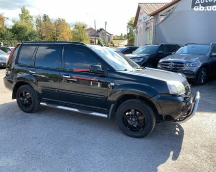 Черный Ниссан ИксТрейл, объемом двигателя 2.5 л и пробегом 295 тыс. км за 6890 $, фото 3 на Automoto.ua