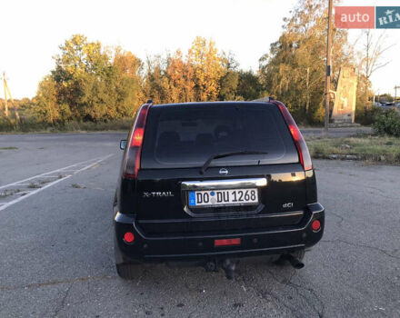 Чорний Ніссан ІксТрейл, об'ємом двигуна 2.2 л та пробігом 250 тис. км за 4199 $, фото 7 на Automoto.ua