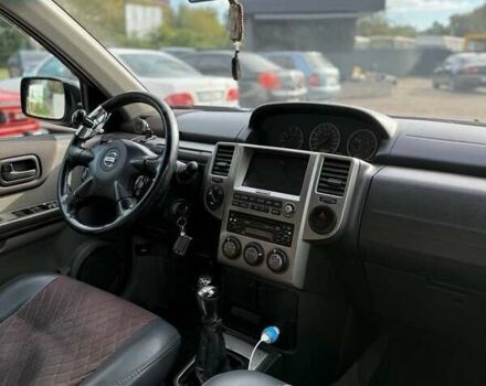 Черный Ниссан ИксТрейл, объемом двигателя 2.2 л и пробегом 360 тыс. км за 7200 $, фото 5 на Automoto.ua