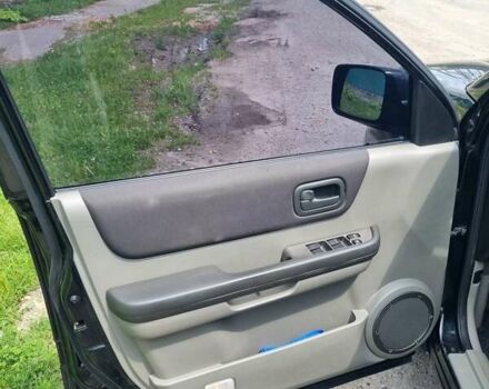 Черный Ниссан ИксТрейл, объемом двигателя 2.18 л и пробегом 210 тыс. км за 6400 $, фото 9 на Automoto.ua