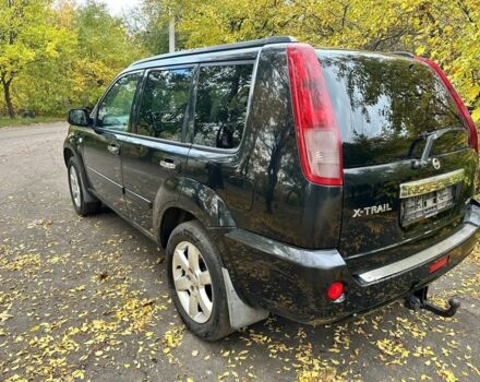 Черный Ниссан ИксТрейл, объемом двигателя 2.2 л и пробегом 270 тыс. км за 3800 $, фото 2 на Automoto.ua