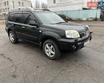 Черный Ниссан ИксТрейл, объемом двигателя 2.5 л и пробегом 285 тыс. км за 6500 $, фото 7 на Automoto.ua