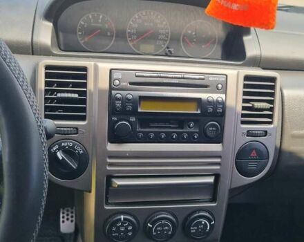 Черный Ниссан ИксТрейл, объемом двигателя 2.18 л и пробегом 210 тыс. км за 6400 $, фото 10 на Automoto.ua