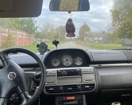 Черный Ниссан ИксТрейл, объемом двигателя 2.2 л и пробегом 327 тыс. км за 3600 $, фото 6 на Automoto.ua