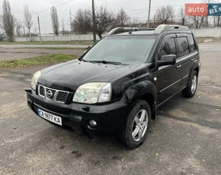 Черный Ниссан ИксТрейл, объемом двигателя 2.5 л и пробегом 285 тыс. км за 6500 $, фото 1 на Automoto.ua