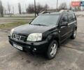 Черный Ниссан ИксТрейл, объемом двигателя 2.5 л и пробегом 285 тыс. км за 6500 $, фото 1 на Automoto.ua