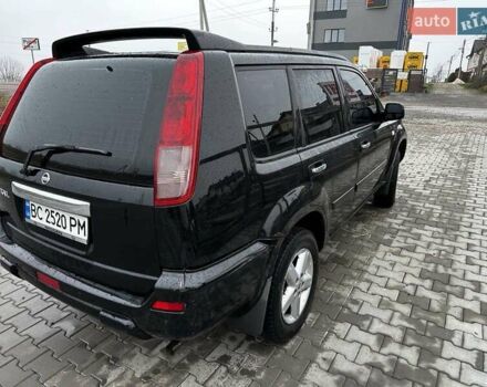 Черный Ниссан ИксТрейл, объемом двигателя 2.5 л и пробегом 282 тыс. км за 6250 $, фото 5 на Automoto.ua