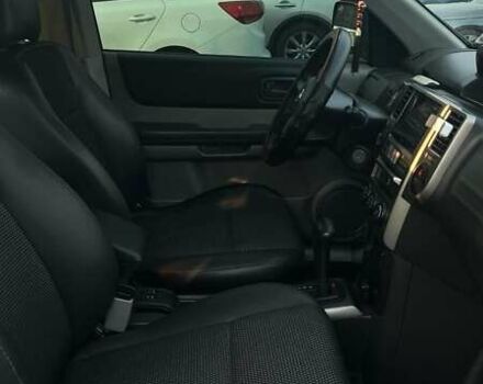 Черный Ниссан ИксТрейл, объемом двигателя 2.5 л и пробегом 261 тыс. км за 8300 $, фото 10 на Automoto.ua