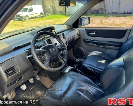 Черный Ниссан ИксТрейл, объемом двигателя 2.2 л и пробегом 239 тыс. км за 3800 $, фото 3 на Automoto.ua