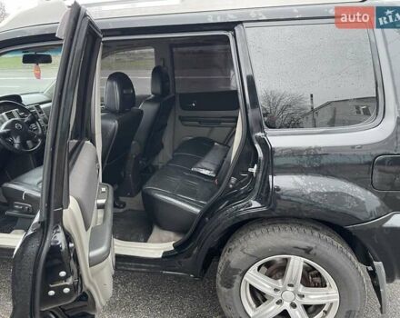 Черный Ниссан ИксТрейл, объемом двигателя 2.5 л и пробегом 285 тыс. км за 6500 $, фото 10 на Automoto.ua