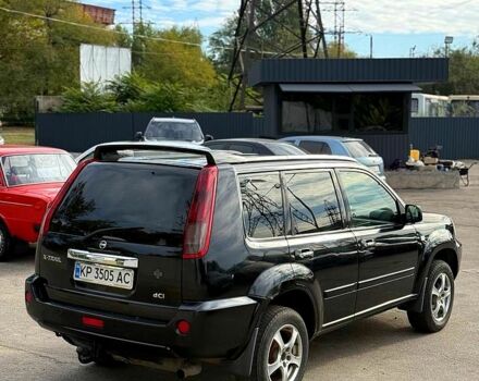 Черный Ниссан ИксТрейл, объемом двигателя 2.2 л и пробегом 360 тыс. км за 7300 $, фото 4 на Automoto.ua