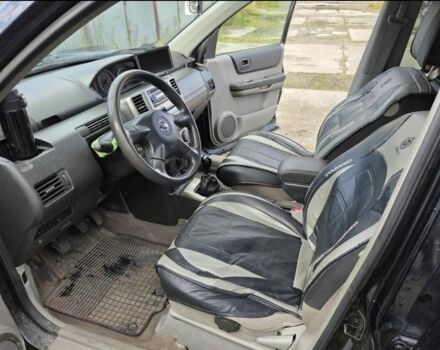 Черный Ниссан ИксТрейл, объемом двигателя 2.2 л и пробегом 220 тыс. км за 2250 $, фото 7 на Automoto.ua