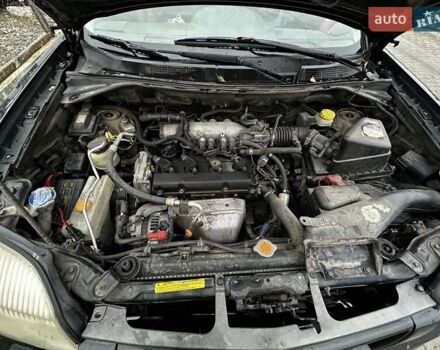 Черный Ниссан ИксТрейл, объемом двигателя 2.5 л и пробегом 282 тыс. км за 6250 $, фото 11 на Automoto.ua