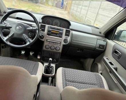 Черный Ниссан ИксТрейл, объемом двигателя 2.2 л и пробегом 290 тыс. км за 3750 $, фото 8 на Automoto.ua