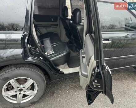 Черный Ниссан ИксТрейл, объемом двигателя 2.5 л и пробегом 285 тыс. км за 6500 $, фото 12 на Automoto.ua