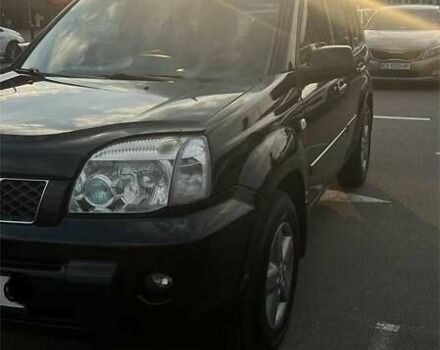 Черный Ниссан ИксТрейл, объемом двигателя 2.5 л и пробегом 261 тыс. км за 8300 $, фото 7 на Automoto.ua