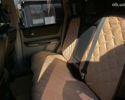 Черный Ниссан ИксТрейл, объемом двигателя 2.5 л и пробегом 295 тыс. км за 6890 $, фото 26 на Automoto.ua