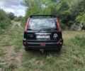 Черный Ниссан ИксТрейл, объемом двигателя 2.2 л и пробегом 320 тыс. км за 4429 $, фото 3 на Automoto.ua