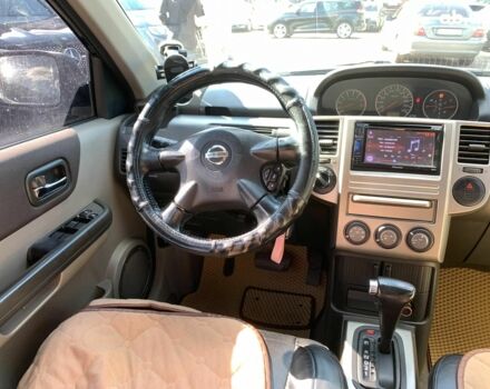 Черный Ниссан ИксТрейл, объемом двигателя 2.5 л и пробегом 295 тыс. км за 6890 $, фото 28 на Automoto.ua