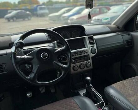 Черный Ниссан ИксТрейл, объемом двигателя 2.2 л и пробегом 360 тыс. км за 7200 $, фото 6 на Automoto.ua