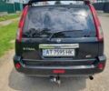 Черный Ниссан ИксТрейл, объемом двигателя 2.18 л и пробегом 210 тыс. км за 6400 $, фото 1 на Automoto.ua