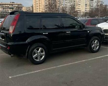 Черный Ниссан ИксТрейл, объемом двигателя 2.5 л и пробегом 261 тыс. км за 8300 $, фото 1 на Automoto.ua