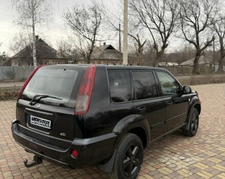 Черный Ниссан ИксТрейл, объемом двигателя 2.2 л и пробегом 249 тыс. км за 2600 $, фото 5 на Automoto.ua