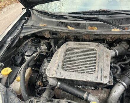 Черный Ниссан ИксТрейл, объемом двигателя 2.2 л и пробегом 327 тыс. км за 3600 $, фото 8 на Automoto.ua