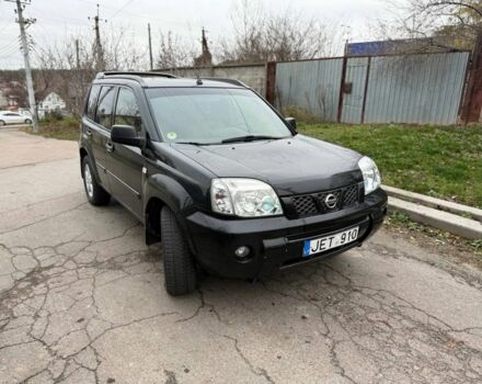 Черный Ниссан ИксТрейл, объемом двигателя 2.2 л и пробегом 290 тыс. км за 3750 $, фото 1 на Automoto.ua